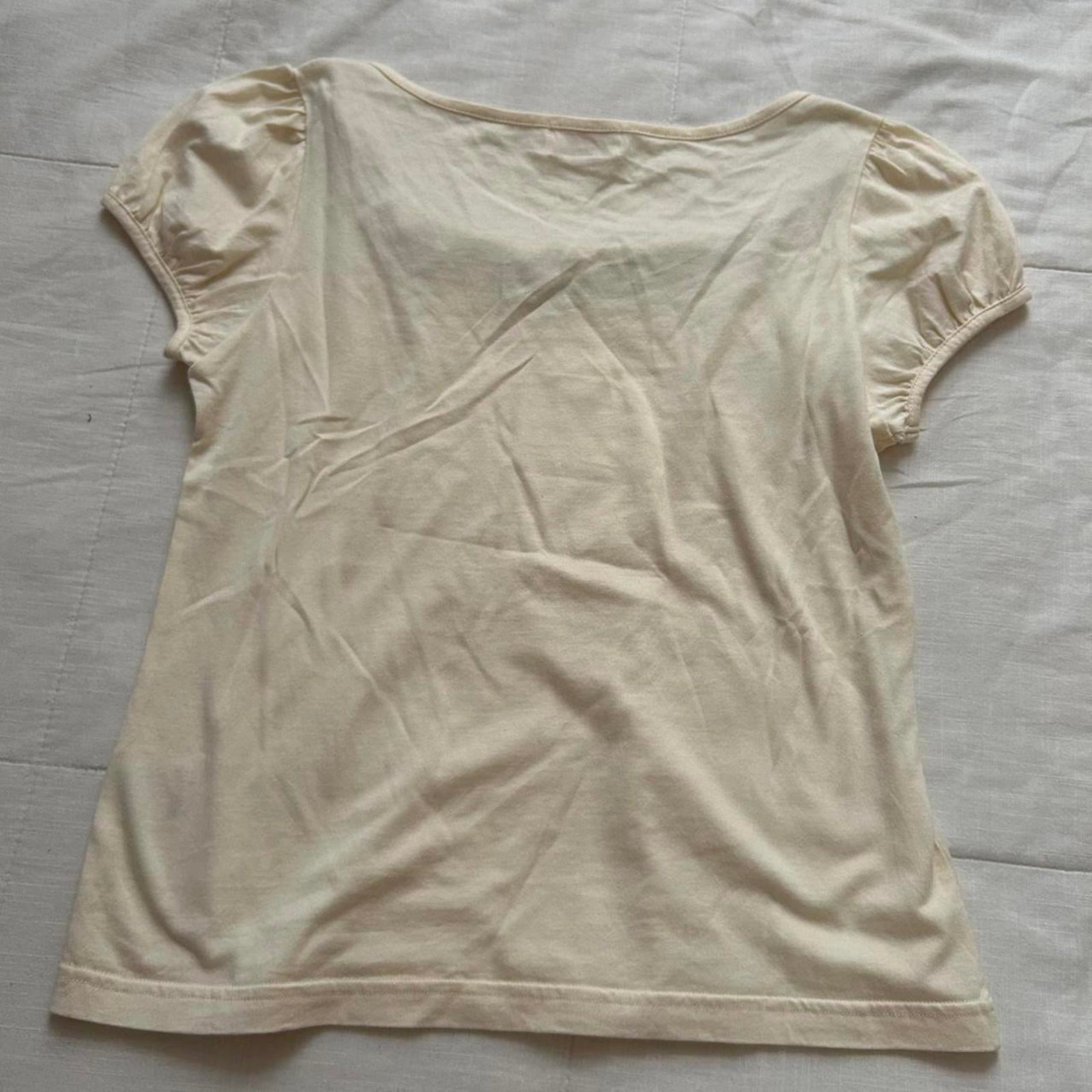 Emily Temple Cute Cream and green lace trim top with red charm detail