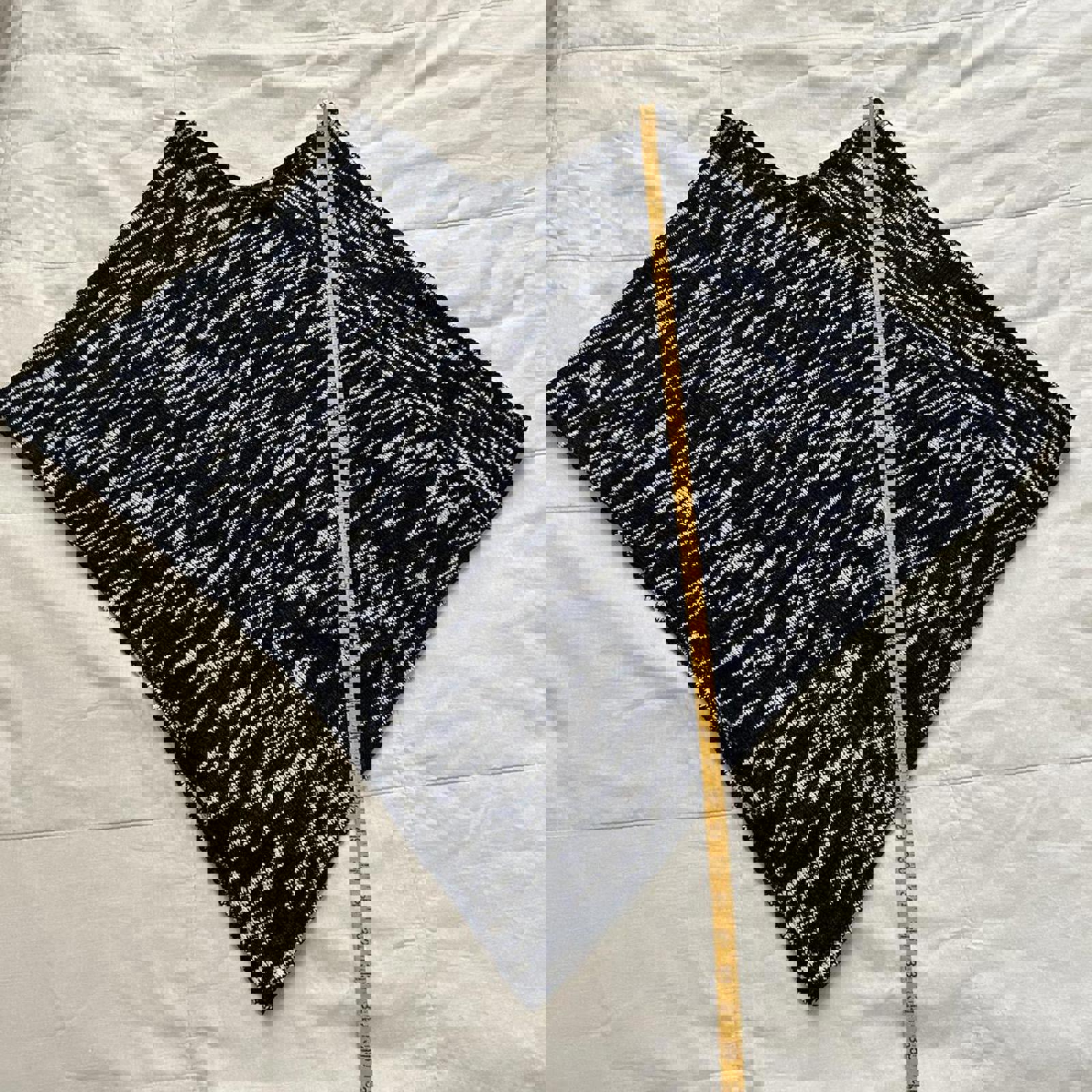 Black and white space dyed yarn knit poncho with a boho vibe