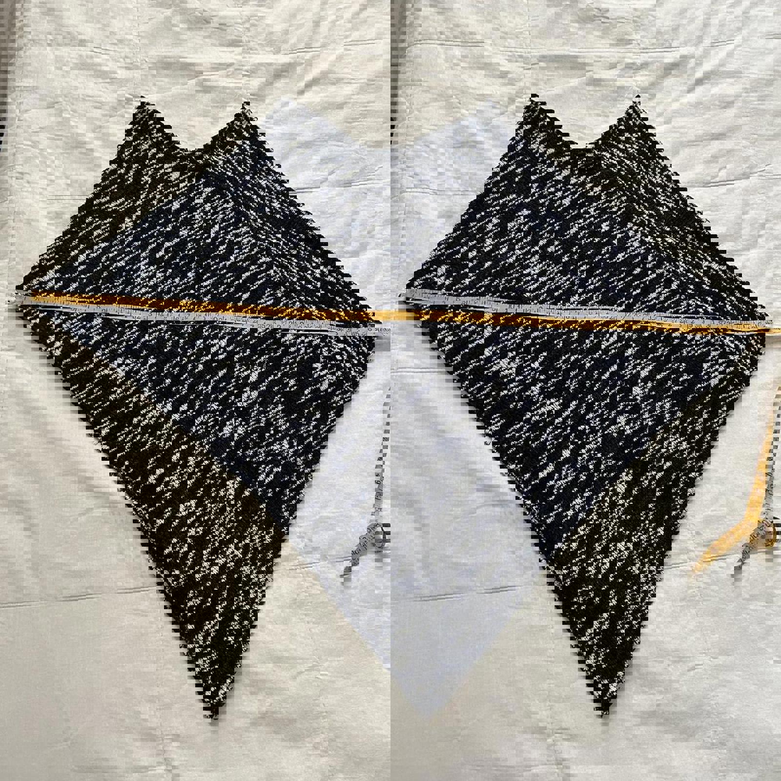 Black and white space dyed yarn knit poncho with a boho vibe