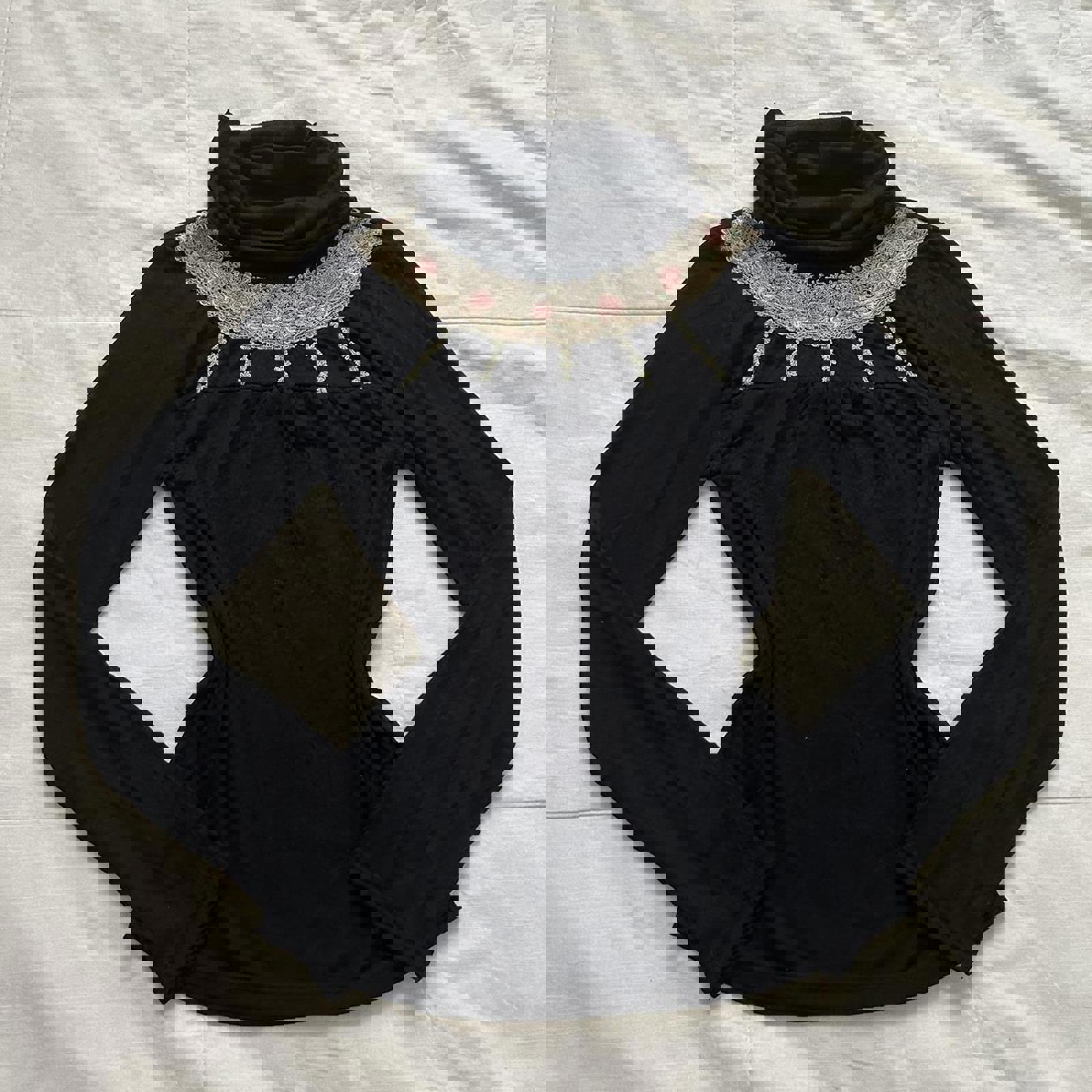 Axes Femme Black long sleeve turtleneck top with floral bib embroidery